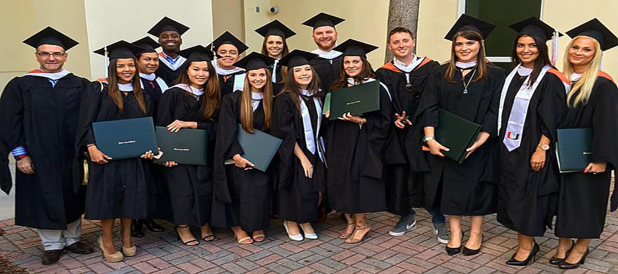 A group of Master of Arts in International Administration students at their graduation ceremony.