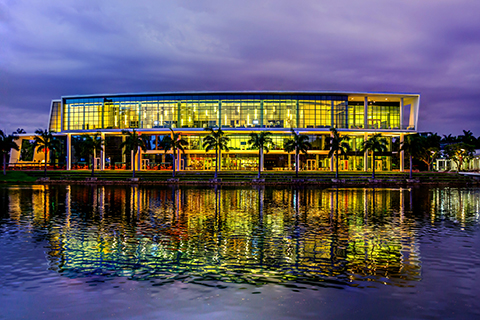 A photo of the Shalala Student Center at night on the University of Miami Coral Gables campus.